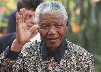 #PHOTOS# TODAY IN HISTORY:Nelson Madela paid solace to the Black stars following their painful defeat to Uruguay.